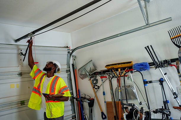 Professional Garage Door Panel Replacement technician working in Springville, NY